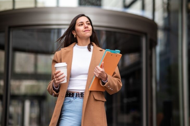 Confident businesswoman walking